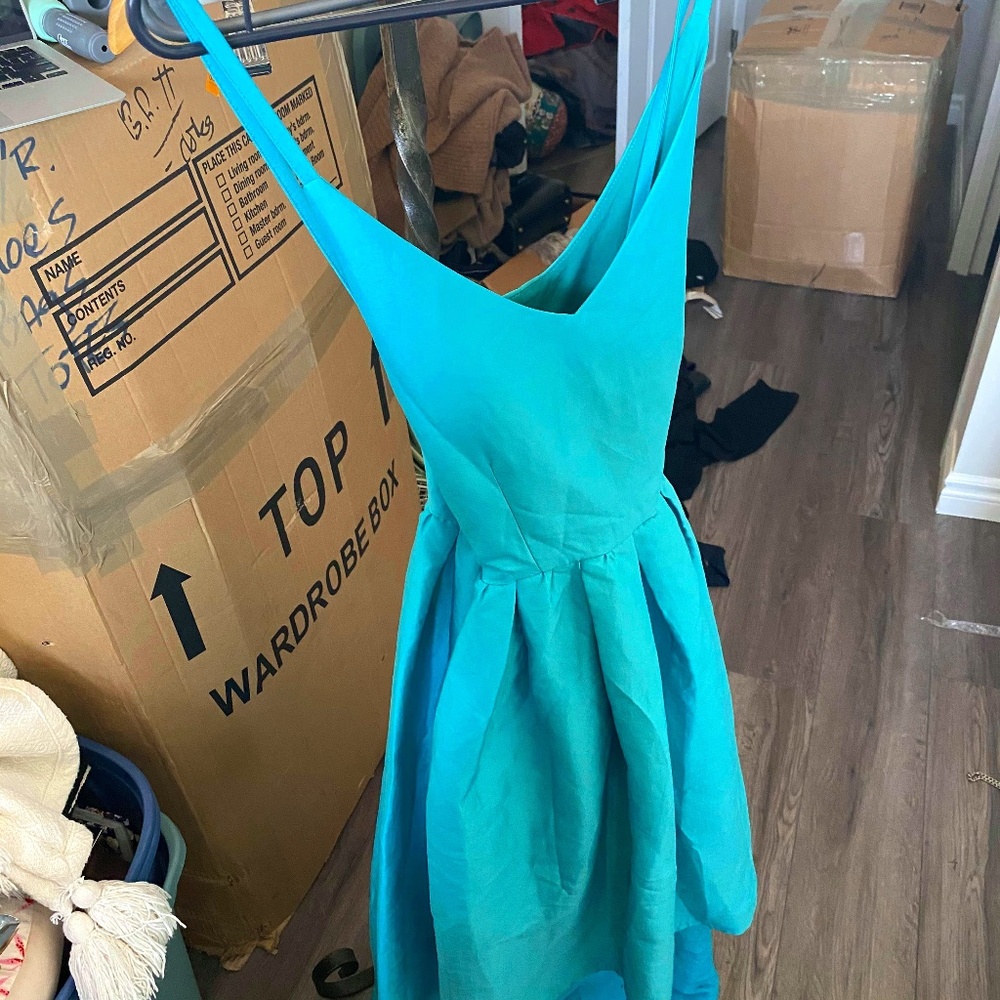 GORGEOUS BACKLESS TEAL DRESS with tags attached